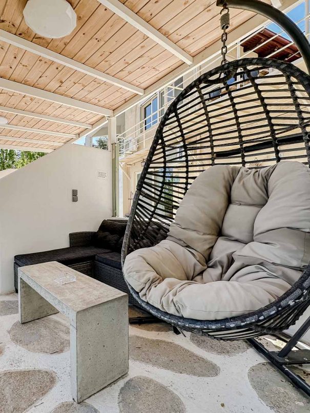 Hanging chair on the private terrace of Guesthouse 2