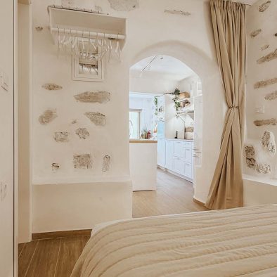 Arched doorway and stone interior of Mountain Bliss Guesthouse 3