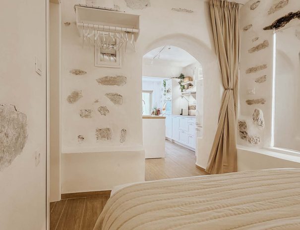 Arched doorway and stone interior of Mountain Bliss Guesthouse 3