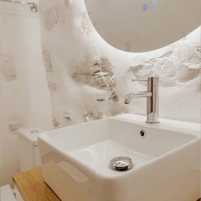 Bathroom sink and stone details in Mountain Bliss Guesthouse 3